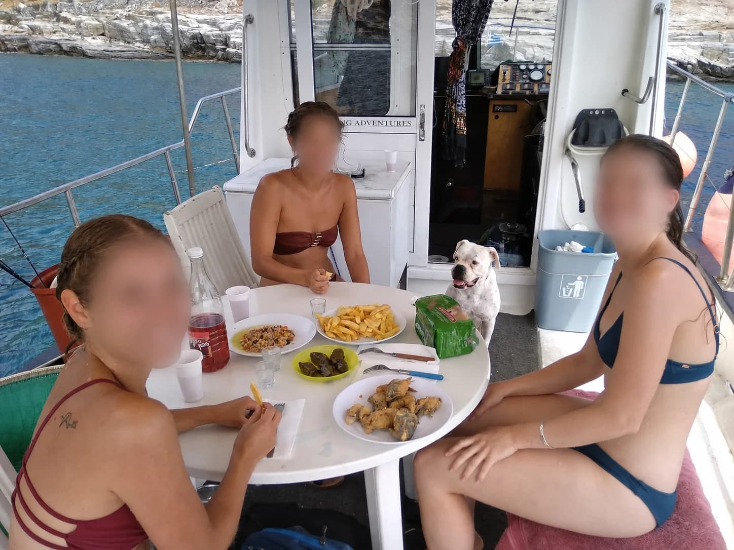A meal shared on board with guests' faces privacy-protected