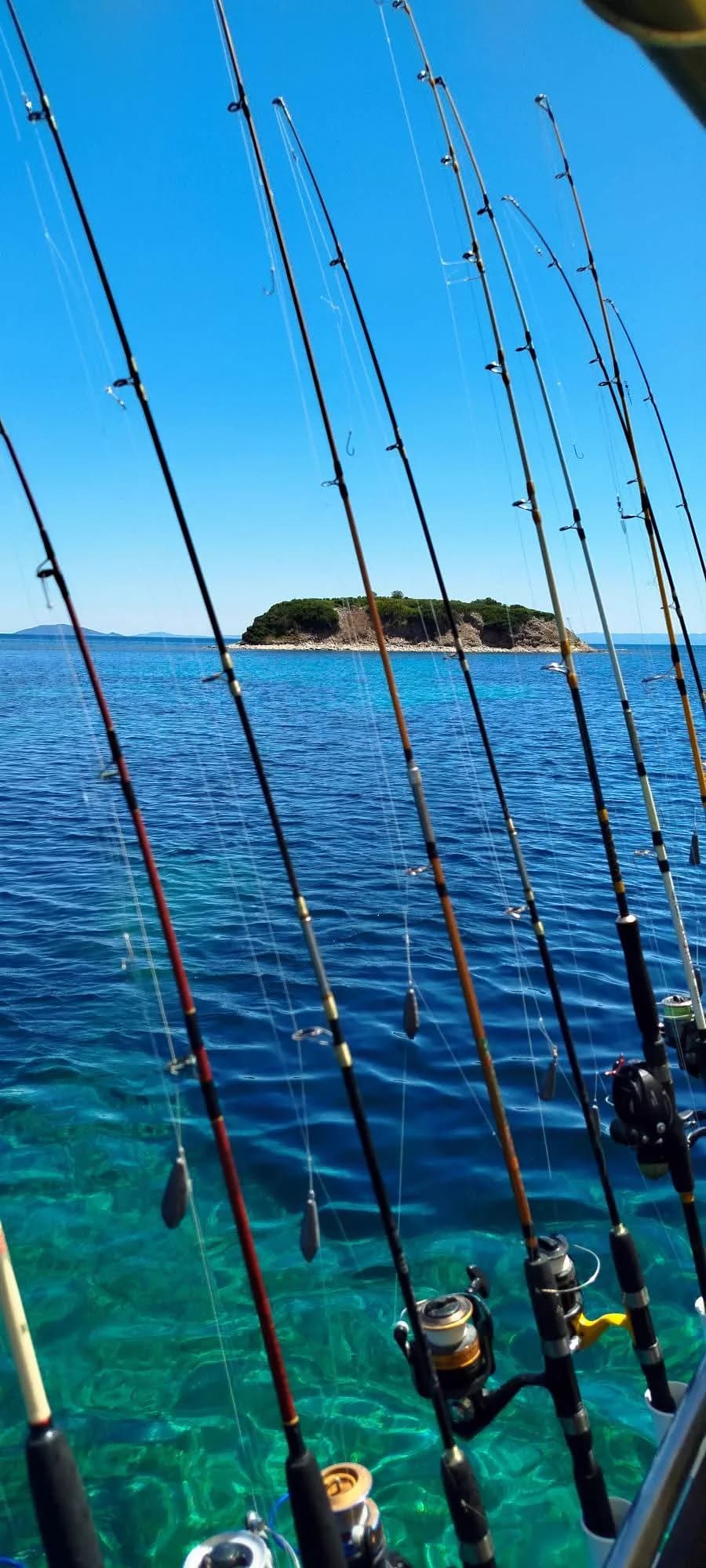 Fishing rods with sinkers prepared on the Fishing 4 You boat